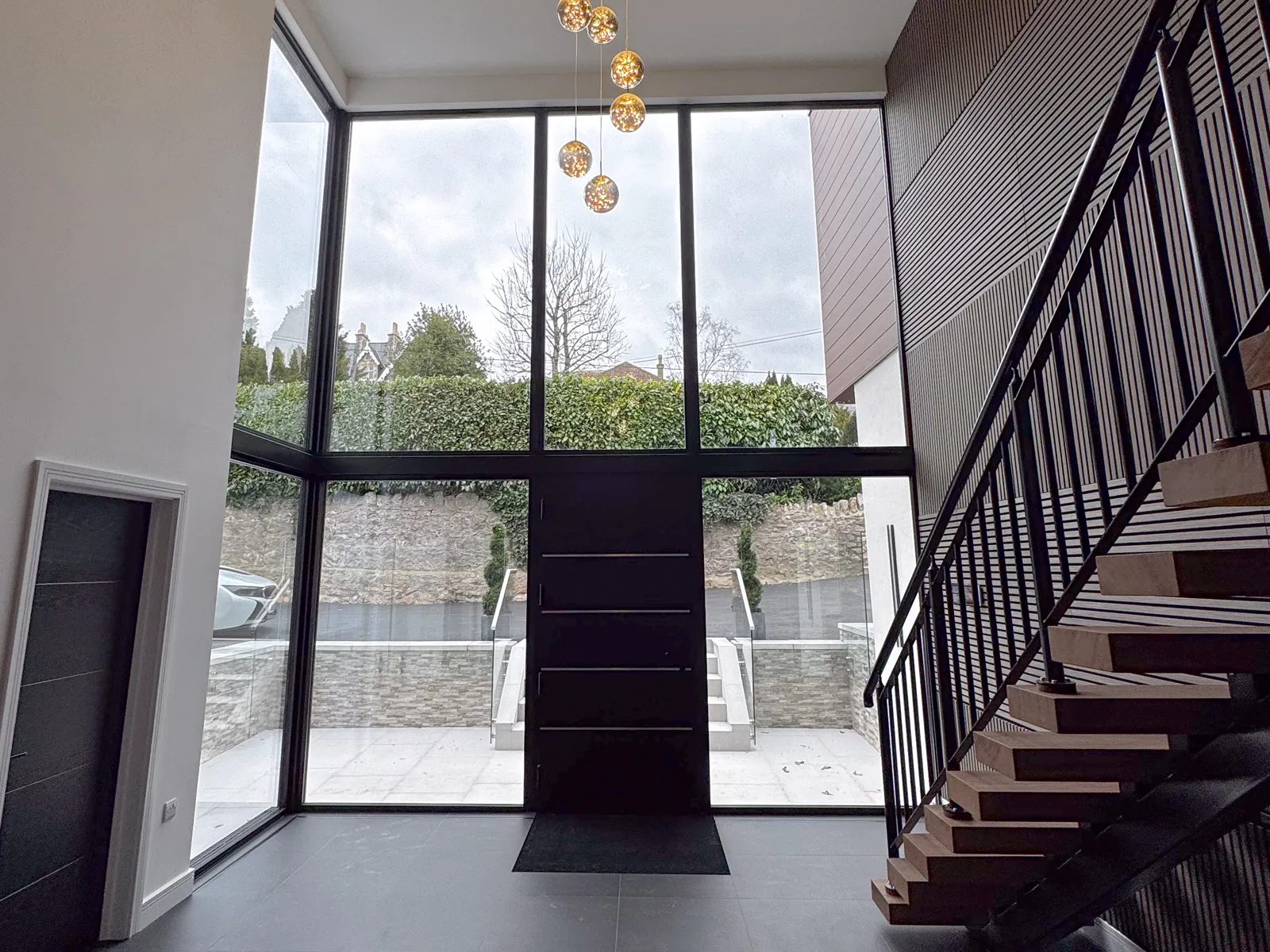 black aluminium entrance door