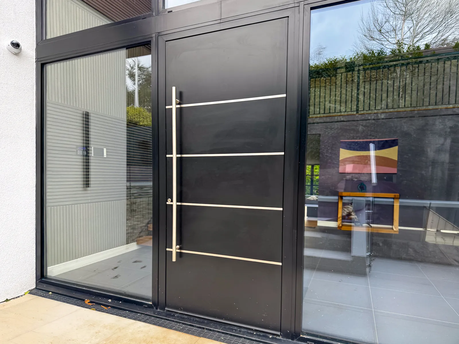 black aluminium pivot door